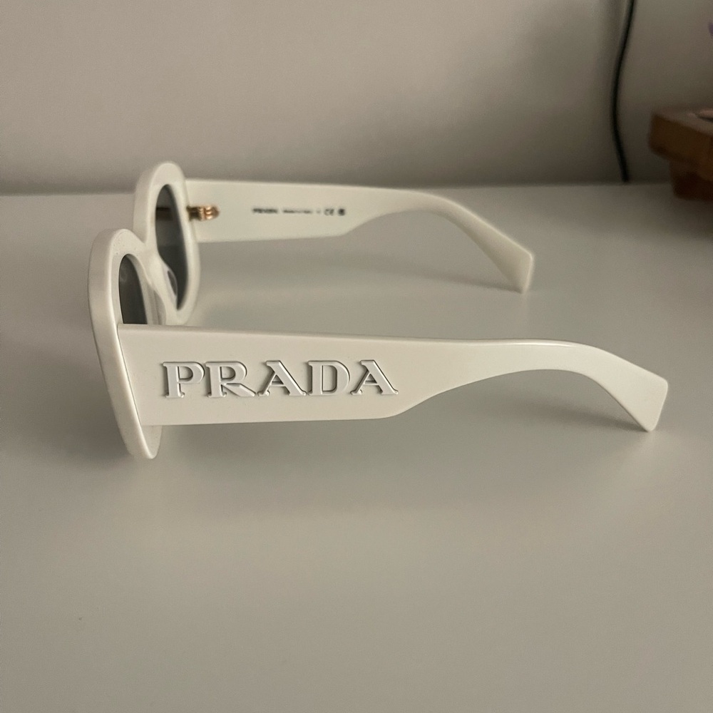 Prada Oversized Logo Oval Sunglasses in Bone